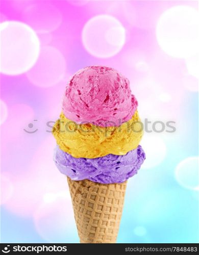 three Ice cream scoops in the cone with abstract light background.. Ice Cream cone