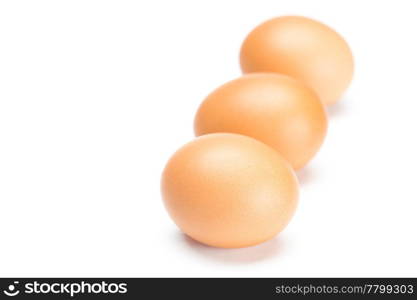 Three large eggs isolated on white