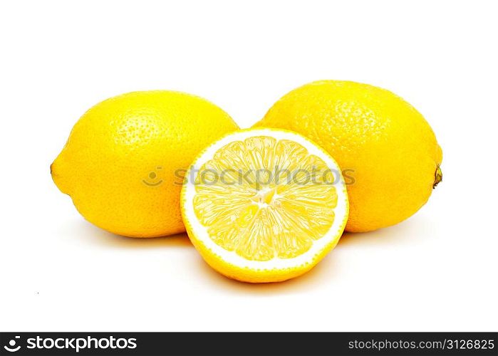 Three lemons isolated on white