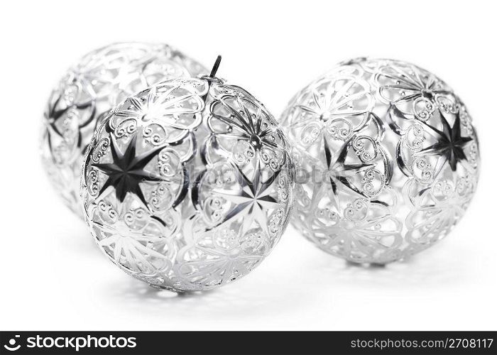 three metal christmas balls. three metal christmas balls on white background