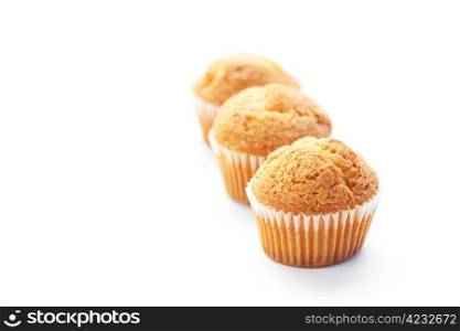 three muffins isolated on white