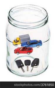 three new cars and keys in open glass jar
