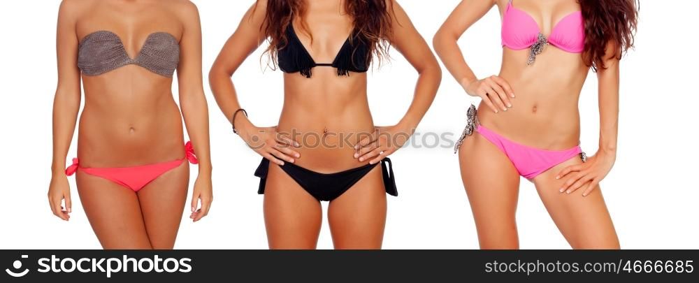 Three nice female bodies with bikini isolated on a white background
