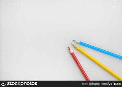 three nice pencils gray background