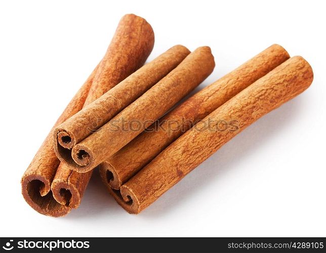 Three of fragrant cinnamon sticks isolated on white background