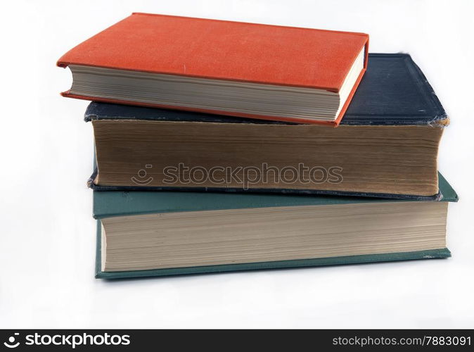 Three old historical books beautiful vintage cover on a white background. Three old books beautiful vintage cover on a white background