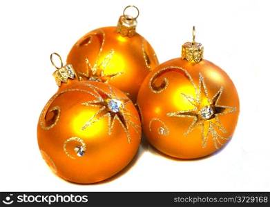 Three orange Christmas balls with golden pattern