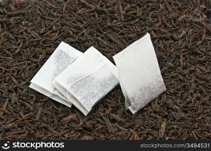 three paper bags with tea