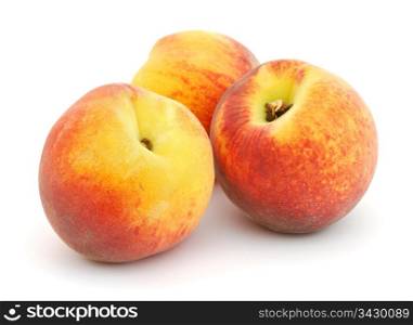 Three peaches isolated on white background. Peaches