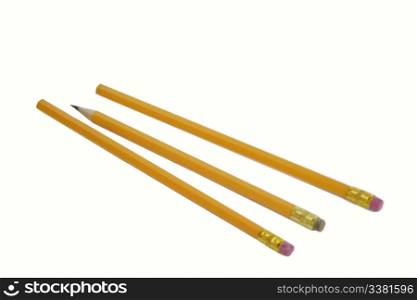 Three pencils with the middle one sharpened