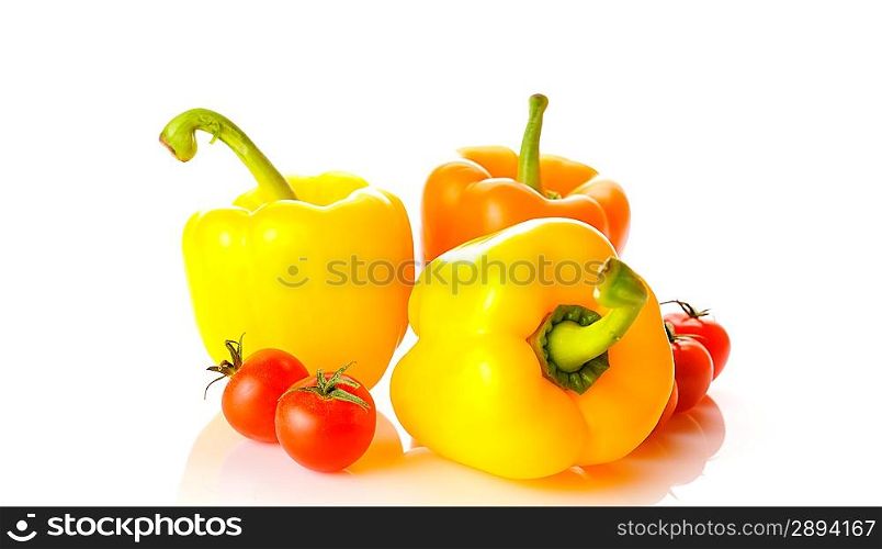 Three peppers over white