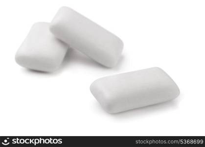 Three pieces of white chewing gum isolated on white
