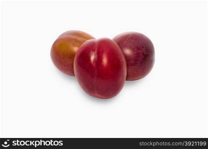 Three plums isolateted on the white background