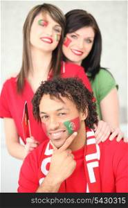 Three Portuguese football supporters