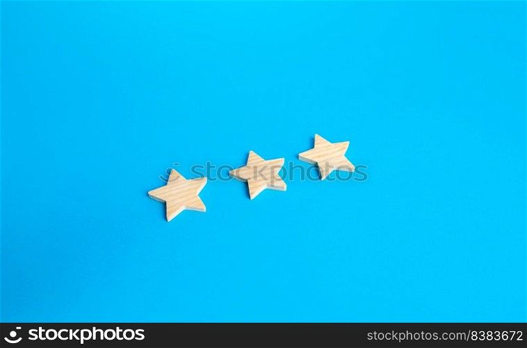 Three rating stars. Rating evaluation concept. Service quality. High satisfaction. Popularity of a restaurant, hotel or mobile applications. Good reputation status. Buyer feedback.