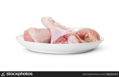 Three Raw Chicken Legs On White Plate Rotated Isolated On White Background