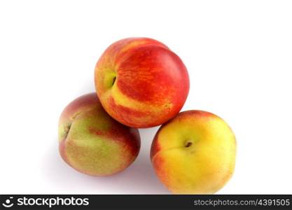 Three red and yellow apples