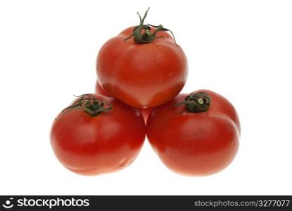 Three red tomatoes isolated on white background.
