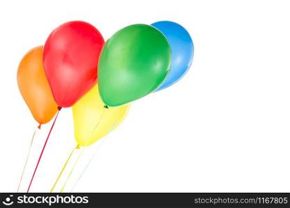 Three red, yellow an blue helium balloons for birthday and celebrations isolated on white background and copy space for free text. Colorful balloons for birthday and celebrations isolated on white background
