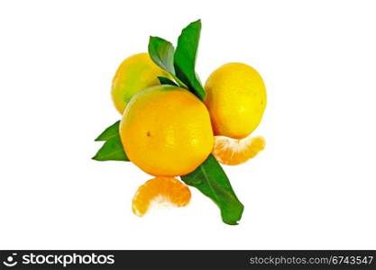 Three ripe mandarin with leaves isolated on white