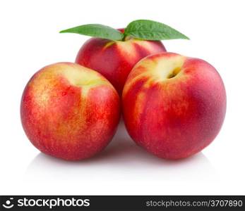 Three ripe peach (nectarine) fruits isolated on white background