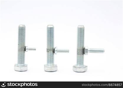 three set of screw in the white space like abstract concept of male erction and enlarge penis. three set of screw in the white space like abstract concept of m