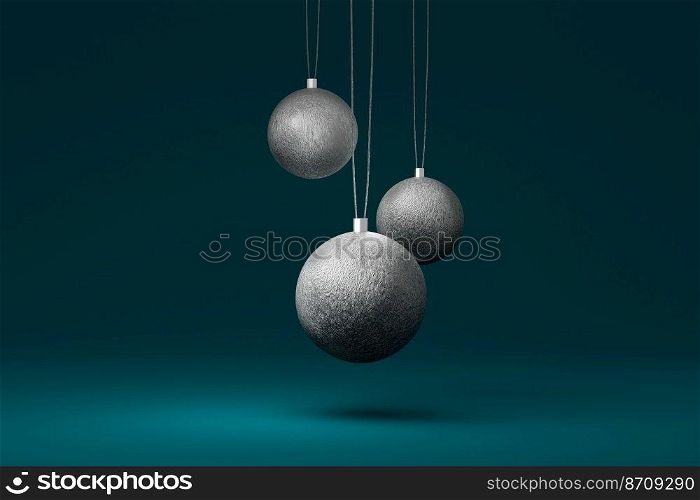 Three silver Christmas tree bauble isolated on a blue background. 3d illustration