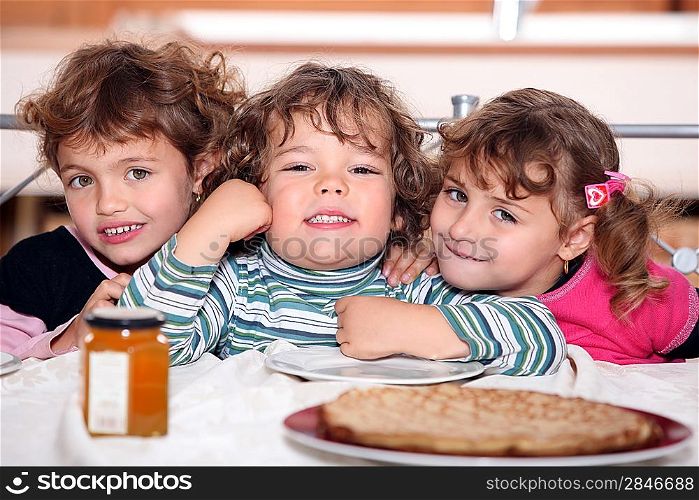 Three sisters enjoying crepes.