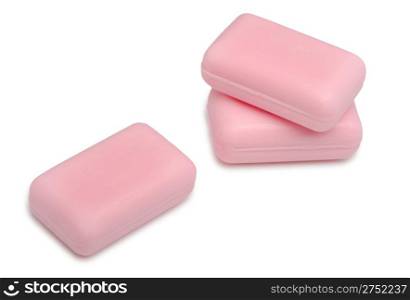 Three soaps of pink color. It is isolated on a white background