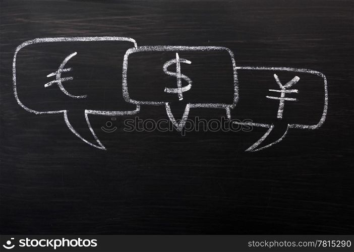Three speech bubbles for Euro, dollar and yuan drawn with chalk on a blackboard