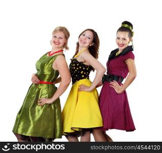 three stylish young woman in bright colour dresses