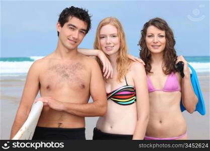 Three teenagers at the beach