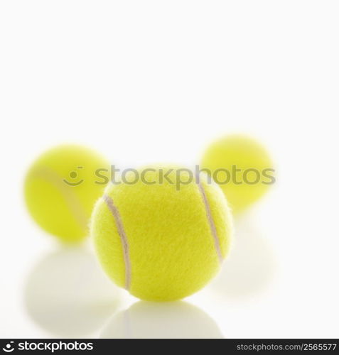 Three tennis balls.