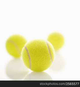 Three tennis balls.