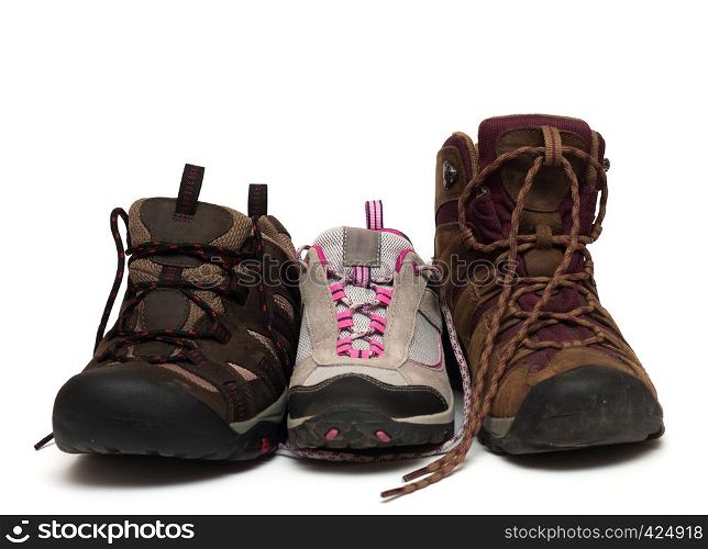 three trekking shoes for the family: father, mother and child