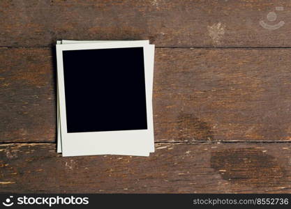 Three vintage frame photo blank on old wood background with space