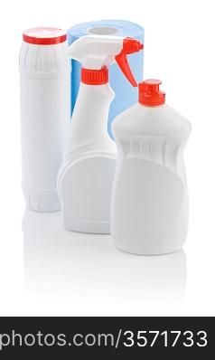 three white cleaner bottle and blue towel