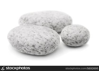 Three white pebbles isolated on white