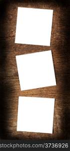 Three white sheet on a wooden background