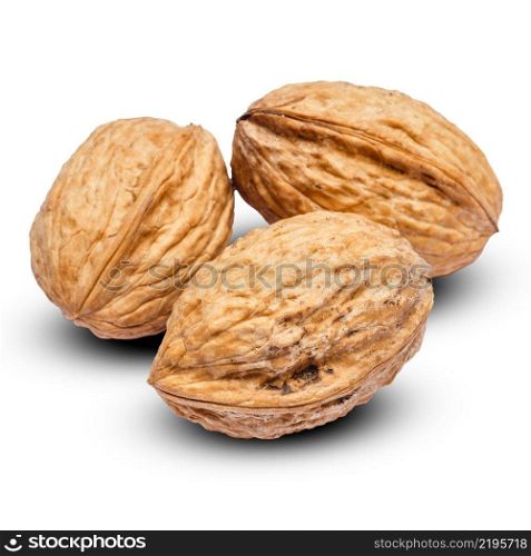 three whole walnuts isolated on white background. clipping path embeeded. three whole walnuts isolated on white background. clipping path