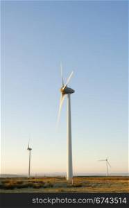 Three wind turbines on a Cornish wind farm, UK.