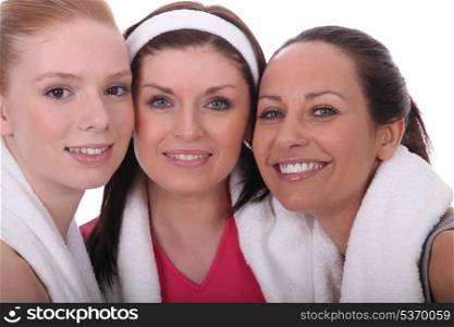 Three woman dressed in gym wear