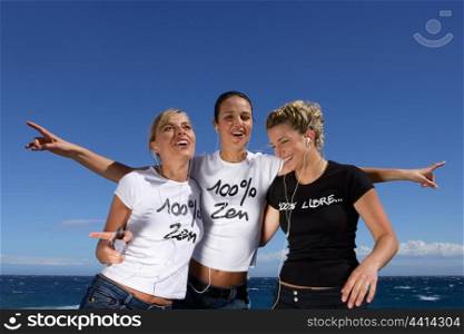 Three women dancing with mp3 players