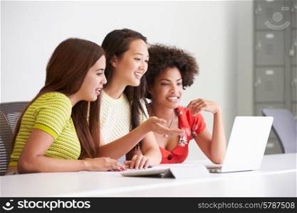 Three Women Working Together In Design Studio