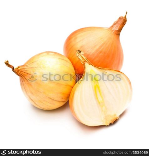three yellow onions isolated on white background