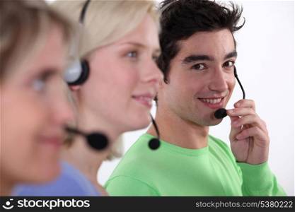 Three young call-center workers