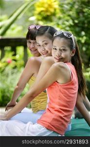 Three young women laughing