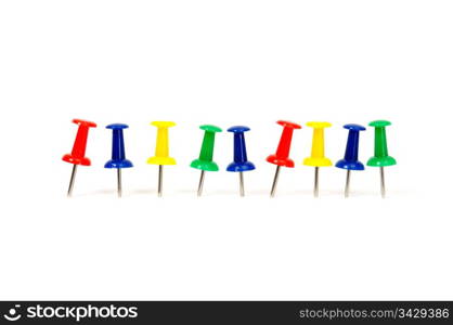 thumb-tacks are isolated on a white background