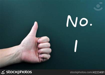 Thumb up with No. 1 written on a blackboard