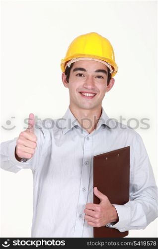 Thumbs up from a builder with a clipboard